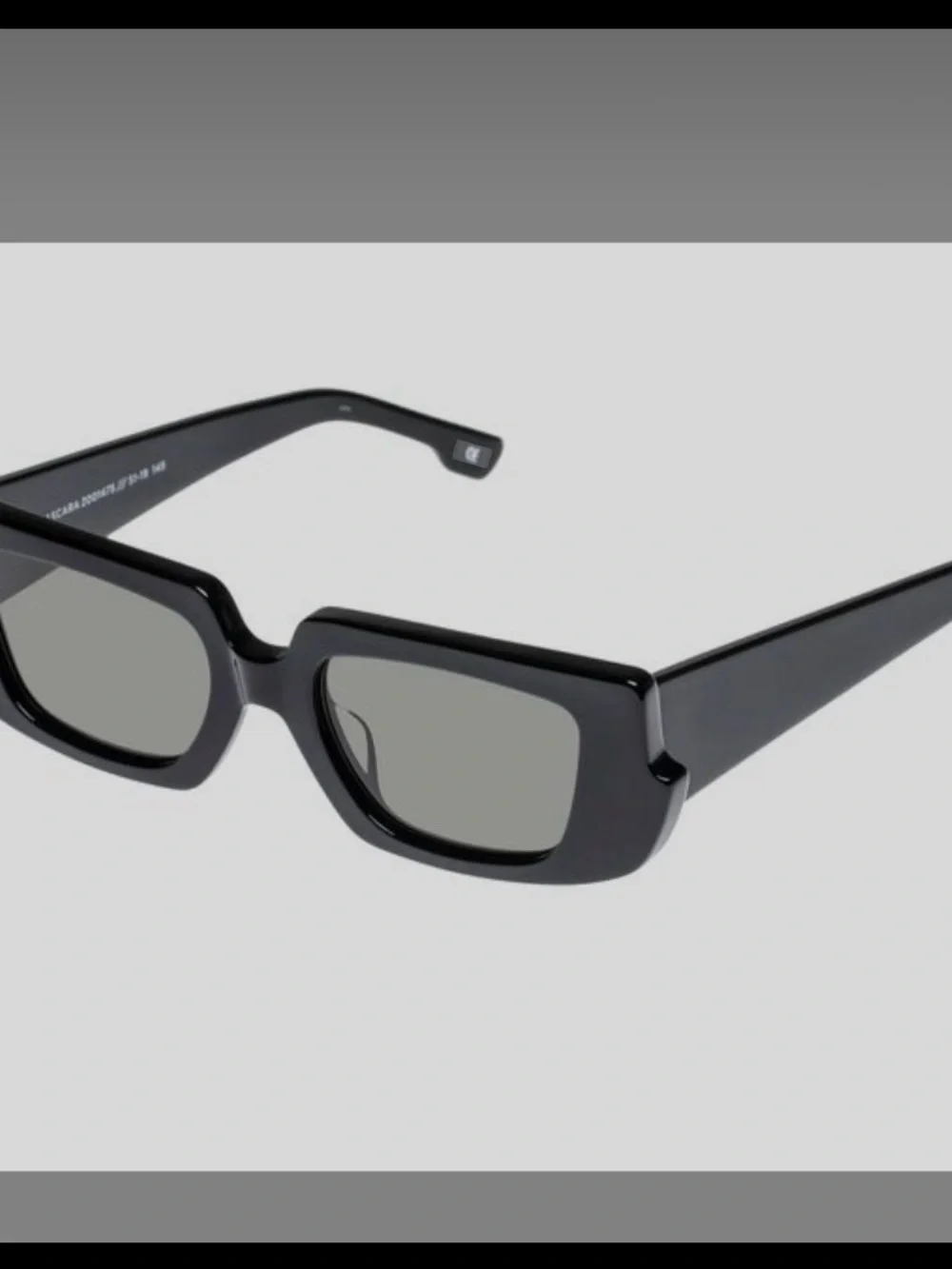 Le Specs sleek black